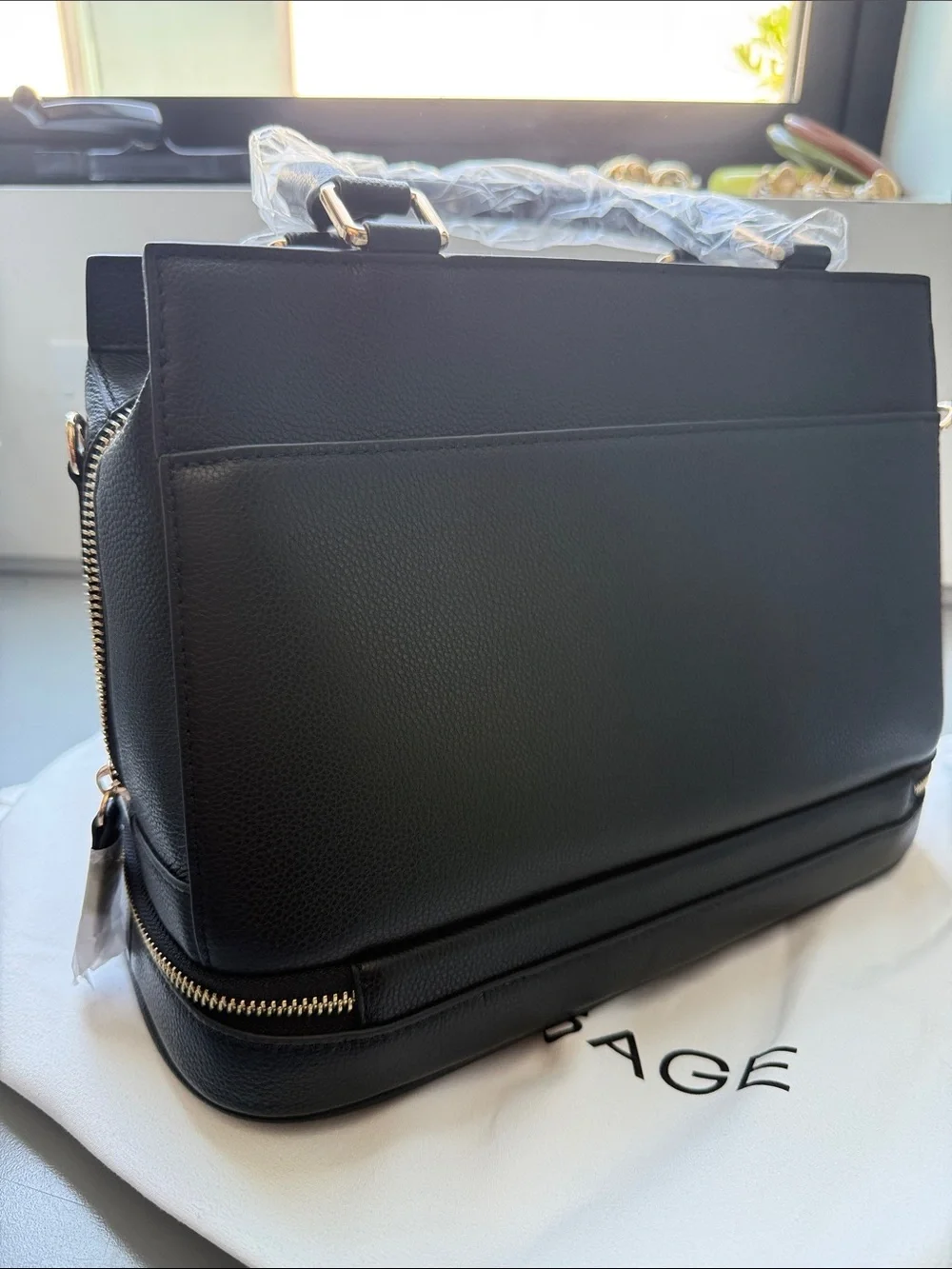 Black Structured Top-Handle Satchel with Gold Charm